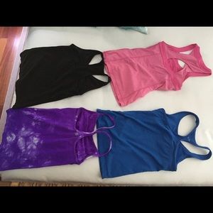 Bundle of athletic yoga tanks with built in bras.